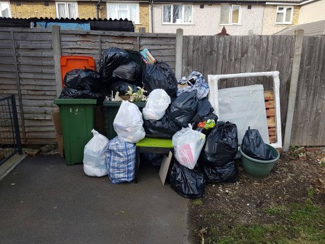 Benefits of garage clearance highlighted in a tidy Staines garage